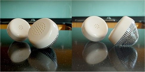 Salt and Pepper Shaker made from old phone ear and mouth pieces