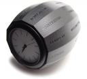 Very simple barrel-shaped world time clock with cities written on the 12 sides