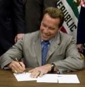 California governor Arnold Schwarzenegger signs bill to ban teens from using mobile devices while driving