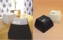 Sit stool is shaped like a computer keyboard key with the word sit on it
