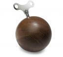 Wooden music orb that plays msuic by winding it up.