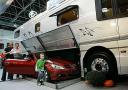 Luxury motorhome from Volkner has a garage built in to store a car underneath