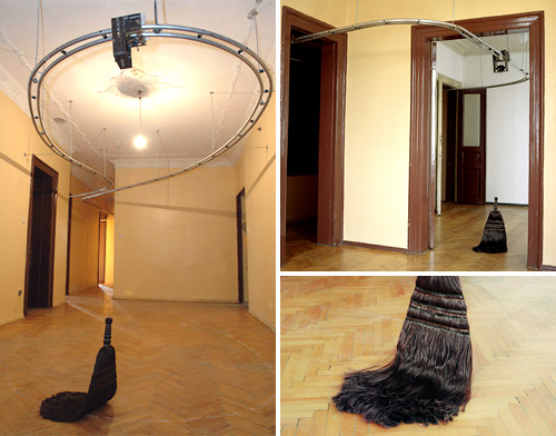 Ceiling track broom is useless but cool