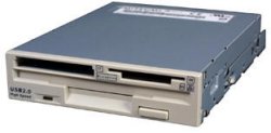 Floppy disk drive with built in memory card reader