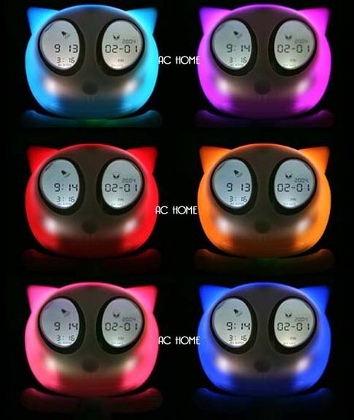 Cat clock wakes you with big eyes, glowing head
