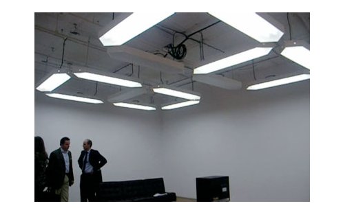 Overhead clock doubles as light fixture