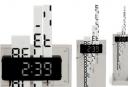 Digimech clock has gear driven display