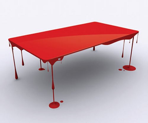 Table floats on paint drip legs