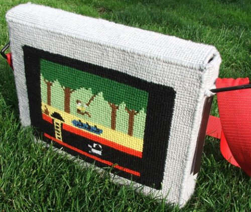 Apple Pitfall needlepoint laptop bag