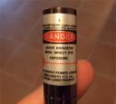 Danger label on the green Elite 125 Wicked Laser