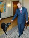 Vladimir Putin puts a satellite collar on his dog