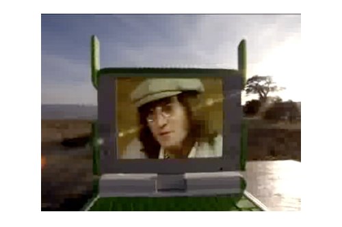John Lennon pushes OLPC from beyond