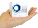 Miniature cube projector with docking speaker