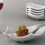 Plate, spoon and glass in one hand
