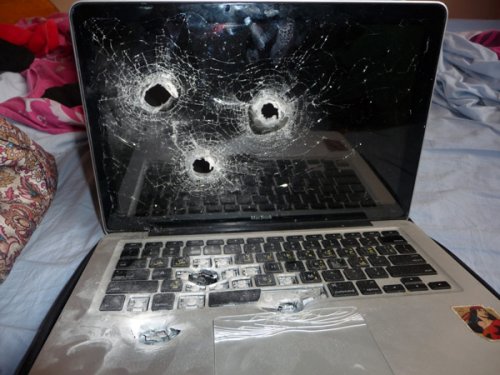 MacBook makes a run for the border, gets shot