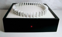 Ouroborus Domino sculpture rebuilds itself