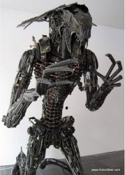 Alien sculpture made from 1,200 lbs of motorcycle steel